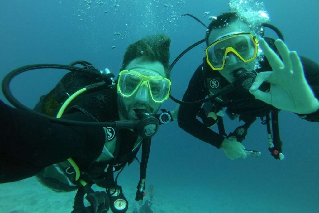 Zanzibar, &Beyond Mnembe Island, People Diving, Escape Safari Co